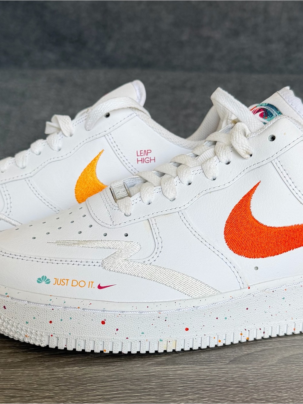 Nike White Sneakers with Orange Swoosh - Leap High